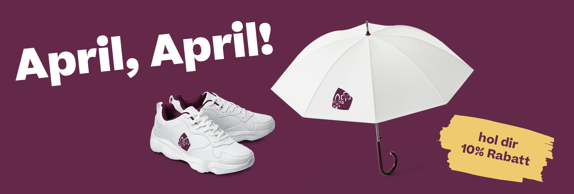 Ein Paar weisse Sneakers und ein aufgespannter weisser Regenschirm, beide Artikel mit PBS-Logo auf lila Hintergrund mit grossem Schriftzug April, April!